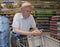 Senior shopping in supermarket