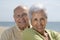 Senior smiling couple at the beach