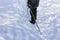 Senior at the snow in winter nordic walking