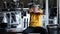 Senior strong man stretch hands in gym