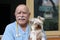 Senior veterinarian holding Yorkshire Terrier