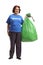 Senior volunteer holding a green waste bag