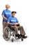 Senior volunteer woman with a senior volunteer man in a wheelchair posing