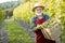 Senior winemaker with grapes on the vineyard