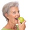 Senior woman with apple