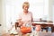 Senior Woman Baking In Kitchen