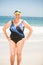 Senior woman with bathing cap at the beach