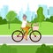 Senior woman on the bicycle in the park. Elderly activity. Old Lady goes to sport, cycles. Elegant person is sitting on