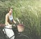 Senior Woman Bicycling Windy Park Concept