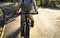 Senior woman biking in the park