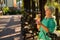 Senior woman blowing bubbles.