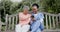 Senior, woman and caregiver with phone in nature with communication, laughing and joke in garden. Elderly, black people