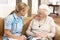 Senior Woman In Discussion With Health Visitor