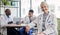 Senior woman, doctor and portrait at hospital desk with smile for healthcare, planning surgery and teamwork. Leader