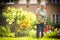 Senior woman doing some gardening in her lovely garden