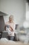 Senior Woman Drying Dishes