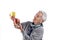 Senior woman eating apple on white