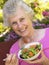 Senior Woman Eating Fresh Salad