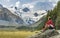 Senior Woman on electric bicycle in Engadin valley, Switzerland