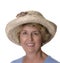 Senior woman in elegant straw hat