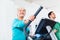 Senior woman on elliptical trainer exercising