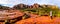 Senior woman enjoying the view of Cathedral Rock and other red rock mountains surrounding the town of Sedona