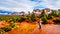 Senior woman enjoying the view of Lee Mountain and other red rock mountains surrounding the town of Sedona