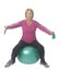 Senior woman on exercise ball with resistance band