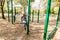 Senior Woman Exercising At Outdoor Fitness Park