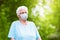 Senior woman in face mask. Virus outbreak