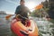 Senior woman getting kayaking lessons from a man