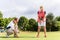 Senior woman and golf pro practicing their sport