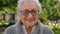 Senior woman, happy and smile of a person from Guatemala laughing with happiness outdoor. Portrait of an elderly woman