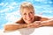 Senior Woman Having Fun In Swimming Pool