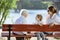 Senior woman, her adult granddaughter and great grandson in park