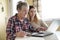 Senior woman with her daughter online purchasing together