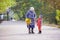 Senior woman and her great grandson on walk in park