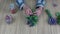 Senior woman herbalist hands binding fresh anise hyssop bunch for dry