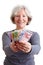 Senior woman holding banknotes