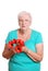 Senior woman holding fake red poppies