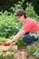 Senior woman in kitchen garden