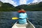 Senior woman in a life jacket in a canoe on Lake Escondido. Tierra del Fuego, Argentina - December 16, 2014