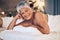 Senior woman, massage and portrait with luxury treatment in retirement with a smile. Female person, beauty salon and spa