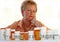 Senior woman with medicine bottles