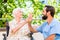 Senior woman and nurse giving High five