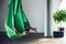 Senior woman practices different inversion antigravity yoga