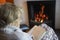 Senior Woman Reading Book At Home