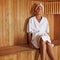 Senior woman relaxing in sauna