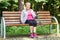 Senior woman resting after nordic walking, sporty lifestyles in old age