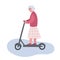 Senior woman riding scooter